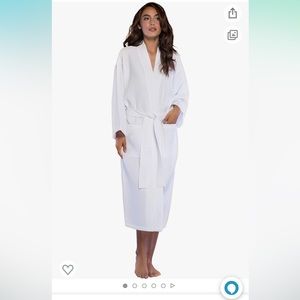 White waffle robe, small snag in the sleeve. Otherwise good robe